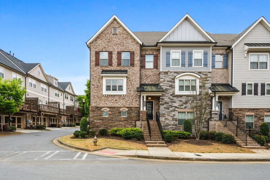 Welcome to 173 Marietta Walk Trace   a beautifully maintained, move-in ready townhome located just steps from Historic Marietta Square. This 3-bedroom, 3.5-bathroom home offers modern design, spacious living, and an unbeatable walkable location. The open-concept main level features a bright living area with hardwood floors, elegant crown molding, and seamless flow into the dining space and kitchen. The gourmet kitchen boasts stainless steel appliances, granite countertops, a large center island with bar seating, and a walk-in pantry   perfect for everyday living and entertaining alike. Upstairs, the oversized primary suite provides a relaxing retreat with a spa-inspired en-suite bathroom and generous walk-in closet. A secondary bedroom with its own private full bath completes the upper level. The terrace level offers a third bedroom with its own private en-suite full bathroom   ideal for a guest suite, roommate setup, or private home office. Additional features include a private balcony, two-car garage, and access to community amenities including a pool and green space. Enjoy the low-maintenance lifestyle of Marietta Walk while living just minutes from dining, shopping, weekend festivals, and everything Marietta Square has to offer.