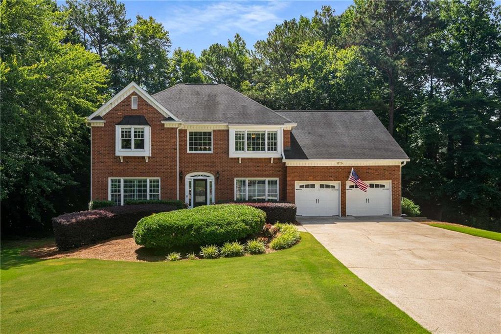 This stunning brick home is tucked away on a quiet cul-de-sac lot in one of East Cobb’s most desirable swim/tennis communities. It offers the perfect blend of elegance, comfort, and functionality—all within the top-rated Walton High School district. You are greeted by a light-filled two-story foyer with hardwood floors that flow seamlessly throughout the main level. This home features expansive living spaces, including a dedicated home office or study, a formal dining room, and a warm, fireside family room. The kitchen is a true standout that was completely renovated in 2023, featuring light gray cabinets, stone countertops, SS appliances, and plenty of space for cooking and entertaining. Upstairs, you'll find a truly spacious owner’s retreat with a spa-like bath with double vanities, a seamless glass shower, and a large custom walk-in closet. Three additional bedrooms and two full baths provide an abundance of space. The terrace level is ready for entertaining with a rec room, full bath, bar area, and a large unfinished space—perfect for storage or future expansion. This home is located in the sought after Chadds Lake offering swim/tennis and community lake perfect for canoeing, kayaking, and fishing. This home checks every box and offers exceptional value in a coveted East Cobb location. Don’t miss your chance—schedule a private showing today and make this your forever home!