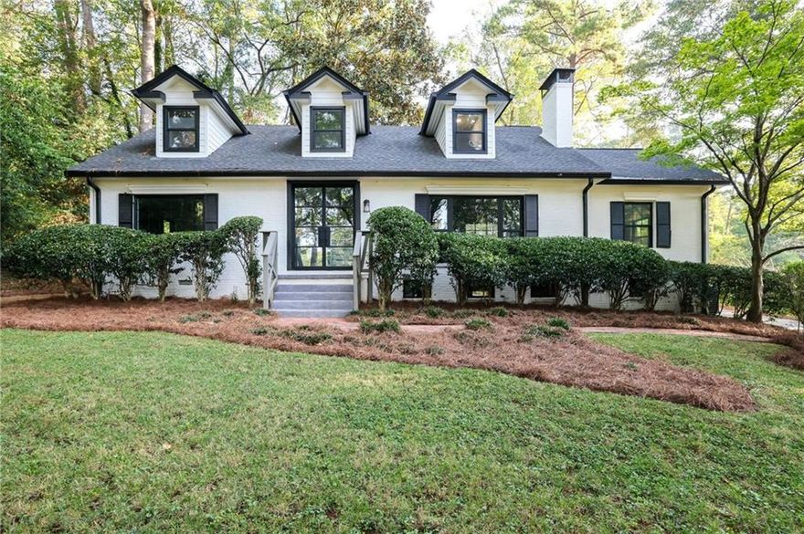 ON MARKET OCTOBER 17! Welcome to the perfect family home in sought after Peachtree Battle! Master on the Main and Carriage House! With unmatched curb appeal, you are immediately drawn to this spacious home. The main level boasts a beautiful master suite walk-in closet and a large exquisite master bath. In addition to the master suite, the first floor has a guest bath, renovated eat-in kitchen, separate dining room, library/office, and expansive family room with fireplace. The natural light from your new windows and custom steel front door offers views to luscious landscaping and spacious outdoor living featuring built in stone fountain and fire pit, your own private oasis in the heart of the city. The second floor truly makes this the ideal family home with three large bedrooms and two full bathrooms. For additional living space, there is a large finished basement with fireplace, kitchenette, full bath, and outdoor access. PLUS the carriage house/studio apartment located above the two-car garage with full bath, kitchenette, and private access. This extra space provides multiple uses, as guest quarters or large hang-out space perfect for teens or college age children. Make this rare Peachtree Battle Beauty yours today! BONUS: 1BR/1BA 600+ Sq Ft Carriage House, not included in total BR/BA in Main House.