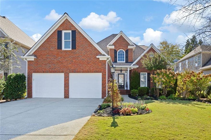 Near the base of Kennesaw Mtn. and within the city limits of Marietta, sits this gorgeously landscaped home. Featuring a double primary suite floor plan, one on the main floor and one upstairs, the options are endless. The main floor has a bright white kitchen open to a large keeping room. Enjoy the evenings in the fully covered, large deck. Master on main has a huge walk-in closet and new paint. Upstairs has the second master and 2 large bedrooms, one with an added play space. The yard is a landscapers dream with beautiful plants and flowers year-round. Top notch amenities include pool, tennis, lake, playground, and clubhouse.