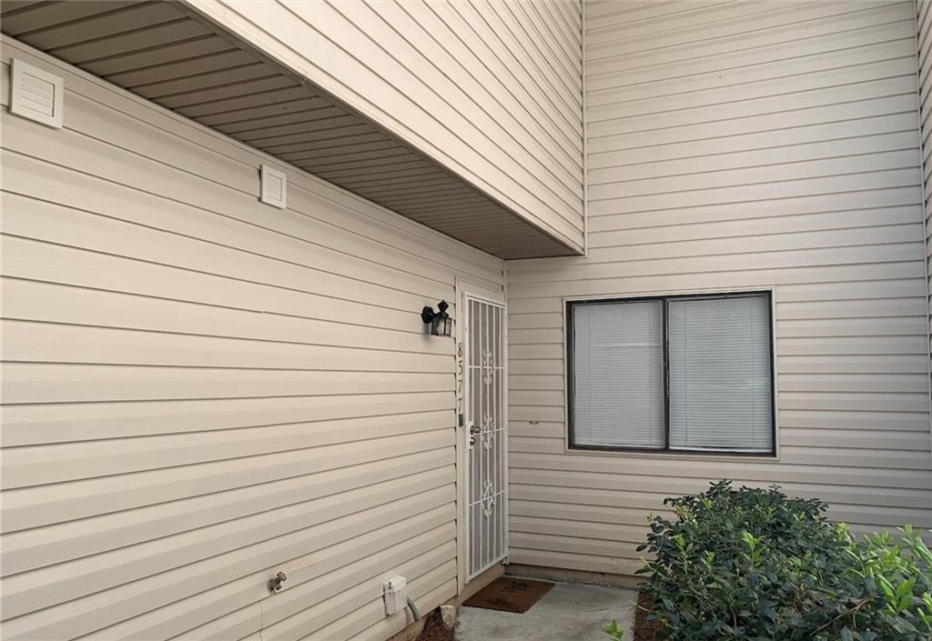Welcome to this 3 bed, 1.5 bath 2-story condo. The kitchen space is open with plenty of cabinet space and stainless steel appliances. Also features dining room and living room areas, a laundry closet, newer water heater and HVAC units, and more! Enjoy the fenced outdoor patio space and your very own assigned parking spaces. Soak in the convenience of being close to shopping, groceries, and public transportation while also being just minutes from the interstate.