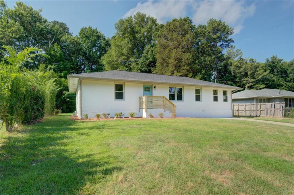 Incredible price on this FULLY-REMODELED and expanded East Atlanta ranch. This home was taken down to the studs and reworked with a large, vaulted ceiling, made into a stunning open floor plan, featuring brand-new cabinetry, counters, appliances, refinished hardwood floors, and a gorgeous master suite addition. All work was permitted and performed by an experienced, professional contractor. Anyone would be hard-pressed to find a better home for the money, location, and quality than 1815 Arkose. Don't miss this one!
