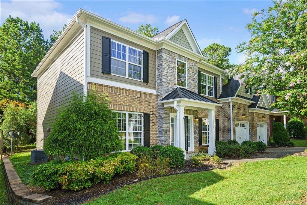 As you enter, you’re greeted by stunning open concept space with formal dining room/ office, perfect for working from home, along with an additional versatile room that can serve as a family room. The main floor also features a dining room, a bright kitchen with quartz countertops, timeless cabinetry, stainless steel appliances, and a cozy breakfast area. A large living room completes the main level, offering plenty of space to relax and entertain.
Beautiful hardwood floors run throughout the majority of the main level, and the great room with a fireplace adds warmth and charm. The sunroom overlooks the private backyard and the stunning golf course, providing a peaceful retreat.
Upstairs, you’ll find four bedrooms, including an oversized primary suite with a sitting area that offers a private sanctuary. With 3.5 baths throughout the home, there’s ample space for family and guests.
Mirror Lake offers an exceptional lifestyle with 36 holes of award-winning golf, multiple swimming pools, and a 96-acre lake perfect for fishing, kayaking, and canoeing. Enjoy pickleball and tennis courts, plus nearby Gold Mine City Park, all just 3 minutes from I-20.
This home perfectly blends comfort, style, and an unbeatable location within a vibrant golf course community!