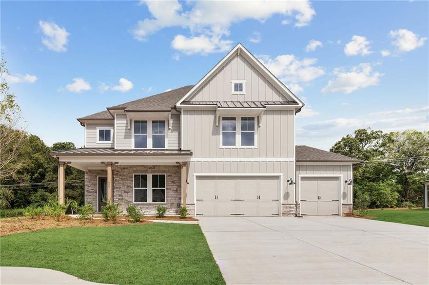READY NOW. Windsong's Wesleyan A plan—a 5-bedroom, 4-bath home thoughtfully designed with over 3,100 sq ft of upscale comfort in Ashbury Commons, a boutique West Cobb community. Step inside and be welcomed by warm Cinnamon Walnut flooring, rich Charcoal cabinetry, and a dramatic stacked mosaic backsplash that sets the tone for the gourmet kitchen. This kitchen is made for entertaining and features Viatera White Pearl quartz countertops, matte black accents, and stainless Frigidaire Gallery appliances. A private guest suite on the main floor offers flexibility, while the upstairs primary retreat stuns with a freestanding tub, bold black fixtures, and soothing Paradise Grey tilework. Every bathroom is a showcase of designer-selected quartz, tile, and hardware—creating spa-like moments throughout.

LIMITED-TIME INCENTIVE: Enjoy up to $15,000 in Flex Cash to use your way—toward closing costs, interest rate buy-down, design upgrades, or a price reduction (must close by 12/18/25 with preferred lender). Conveniently located near top-rated schools, parks, and shopping in vibrant West Cobb. Schedule your tour today—this home is ready when you are.  CURRENTLY, THE PRICE INCLUDES FLEX CASH TOWARDS PRICE REDUCTION.  ALL INCENTIVES ARE ONLY GOOD IF THE BUYER FINANCES WITH ONE OF WINDSONG'S PREFERRED LENDERS OR PAYS CASH.