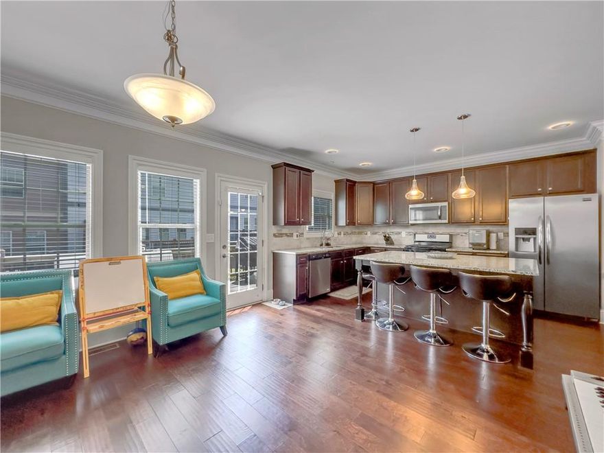 * Motivated Sellers!!!
You'll love this beautiful and bright open concept townhome located in East Cobb's sought-after Oaks at Powers Ferry gated community with low HOA fees.
The home offers an abundance of natural light, a relaxing color palette throughout and beautiful hardwood floors. This space flows flawlessly allowing you to connect with family and friends from multiple areas perfect for living and entertaining!
The spacious kitchen is a dream with Stainless Steel appliances, an island, granite countertops, stylish backsplash, an abundance of cabinets for additional storage and a generously sized pantry. You'll also find the perfect space for a cozy keeping room, additional family room or breakfast nook.
Step out onto the back deck and enjoy that cup of coffee and wind down time! 
Conveniently located near the kitchen is the dining area ready for daily use and those family holiday gatherings. 
As you move to the upper level of the home, you'll notice an extensive primary retreat / ensuite with double vanities, tiled shower and vaulted ceilings. Two additional generously sized bedrooms, centrally located bathroom and laundry closet. 
This property provides options for multigenerational living, with three bedrooms and two full bathrooms on the upper level, as well as a great finished terrace level which includes a full bathroom and ample closet space.
The terrace level presents versatile space for an additional bedroom or a recreational/work area to suit your family's needs. The space has hardwood flooring, two closets, and a full bathroom. This move-in-ready home is just minutes away from I75 and I285, Chattahoochee River Park, Truist Park, shopping/dining, and schools. This home has it all! Embrace a lifestyle you'll love. Don't miss the opportunity to make this exceptional property your own—call today for your private showing! *Sellers offering concessions!!!