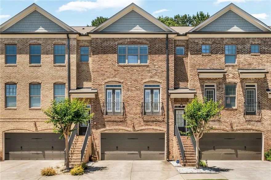 Welcome to this awesome, move-in ready townhome offering the perfect blend of comfort, style, and convenience! Step inside to find beautiful hardwood floors, fresh new carpet, and updated paint throughout. The open floor plan flows seamlessly, highlighted by elegant crown molding and abundant natural light. The kitchen is a chef’s dream with granite countertops, stainless steel appliances, and an impressive touchscreen refrigerator. And don't even get me started with the custom shelves in the pantry.  Speaking of, this is the only unit in the neighborhood with custom closet shelving and shutter blinds.

Upstairs, the luxury primary suite is a perfect get away, featuring a spa-inspired bath, dual vanities, and custom closets. Enjoy the properties outdoor space with a spacious deck and a beautifully wooded backyard complete with a cozy patio—perfect for relaxing or entertaining. Downstairs bedroom is perfect for an in-law suite situation or a home office.  This floor plan is an en-suite layout. 

Ideally located just 10 minutes from Marietta Square and Kennesaw Mountain, with easy access to I-75, shopping, dining, and Publix just around the corner. 20 minute drive to Lake Acworth. This one has it all, y'all so don’t miss it!