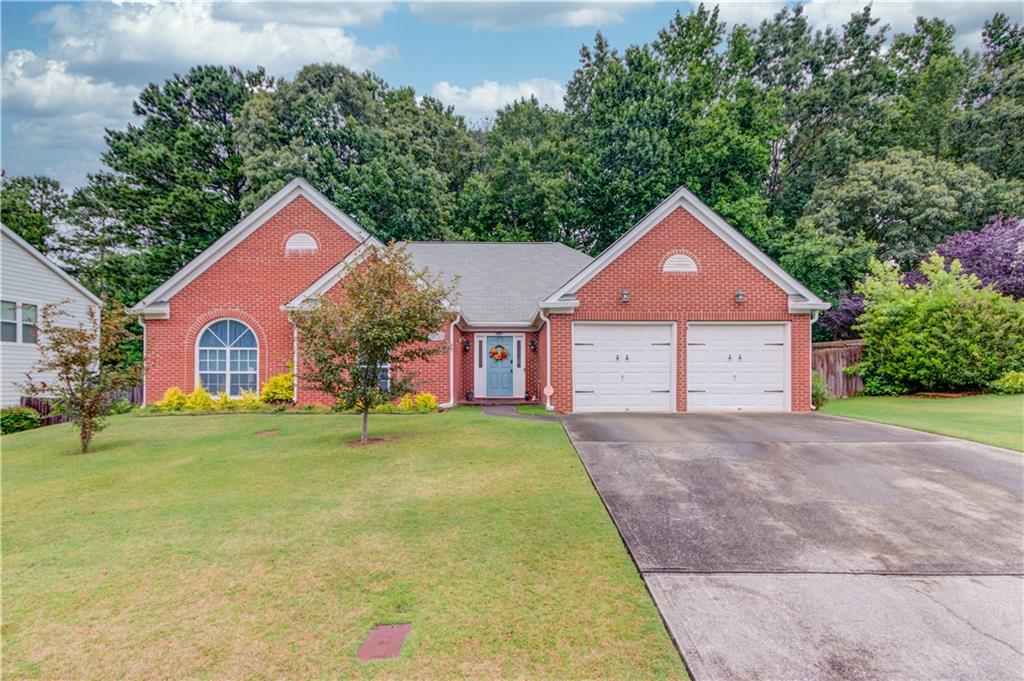 Welcome home to this charming well maintained ranch in a great neighborhood. The foyer invites you into the home and opens to a flex space that can be used as a formal dining room or a home office to suit your needs. The living room features a cozy fireplace with gas logs, creating a warm atmosphere. The large kitchen with an eat-in area boasts an extended island, stainless steel appliances and ample storage space, making this perfect for relaxed family gatherings. Stay organized in command center designed for handling daily tasks and keeping the family connected. Additionally, the keeping room provides a cozy retreat where you can relax with a book or catch up on your favorite TV shows. The spacious master suite comes complete with a trey ceiling, large sitting room & an en-suite bathroom with a relaxing garden tub, separate shower & his and her vanities. Two additional bedrooms and a full bath are perfect for guests or family members and the wide hallway adds to the open feel of the home. Step outside and discover the beautiful patio area with fenced-in backyard and fire pit, ideal for hosting gatherings or simply enjoying the outdoors in privacy. This home boasts NEW LVP flooring adding style & durability to the living spaces. Don't miss the chance to make this home your own!