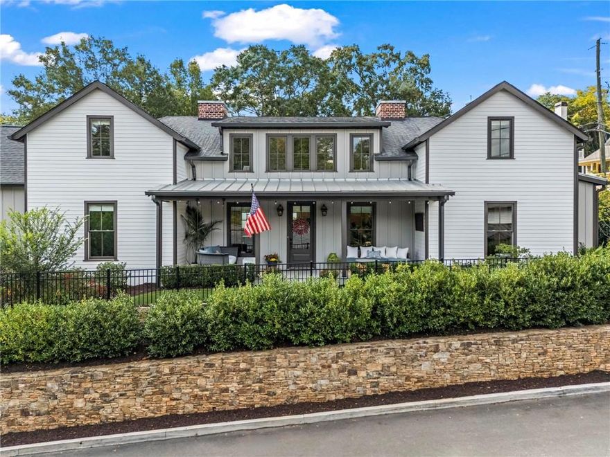 Welcome to 53 Maple Street, a bright, sophisticated, and magazine-worthy residence in the heart of Roswell’s Historic District. This custom home blends timeless design with smart upgrades and unmatched walkability to Canton Street, Roswell Square, Vickery Creek trails, and the Chattahoochee National Park. Situated on a beautifully landscaped corner lot, the home offers multiple outdoor living spaces, including a front porch with a charming swing bed, a private courtyard with a water feature, upgraded turf, stone pavers, and landscape lighting on WiFi timers. The interior is equally stunning, filled with natural light and styled with designer lighting, hardwood and tile flooring throughout, wood-beamed ceilings, shiplap accents, and casement windows. The chefs’ kitchen features Silestone quartz and charcoal soapstone countertops, a large island with farmhouse sink, 48” KitchenAid Pro gas range with griddle, vented hood, built-in refrigerator and dishwasher, custom pull-out pantry shelving, and utility storage under the stairs. The main-level primary suite offers courtyard access and a spa-style bath with a freestanding tub, frameless glass shower with four heads, quartz-topped vanities and premium fixtures. Upstairs, you'll find four generously sized bedrooms, including a well-appointed en suite—each enhanced with designer lighting and custom Bali window treatments. A versatile loft retreat just off the secondary bedrooms provides the perfect space for guests or family to relax, unwind, and feel right at home.The oversized two-car garage features epoxy floors, a built-in wash sink, adjustable shelving, Tesla/NAC charger, and WiFi-enabled garage doors. Smart home features include Google Nest and Camius motion-detecting cameras, WiFi-enabled lighting and shades, keypad entries, tankless water heater scheduling, and spray foam insulation over the garage. Every detail in this home has been thoughtfully curated to inspire—from everyday functionality to swoon-worthy design moments—making it one of Historic Roswell’s most elegant and turnkey opportunities. ***Boutique Design. Premier Location. Effortlessly Roswell.