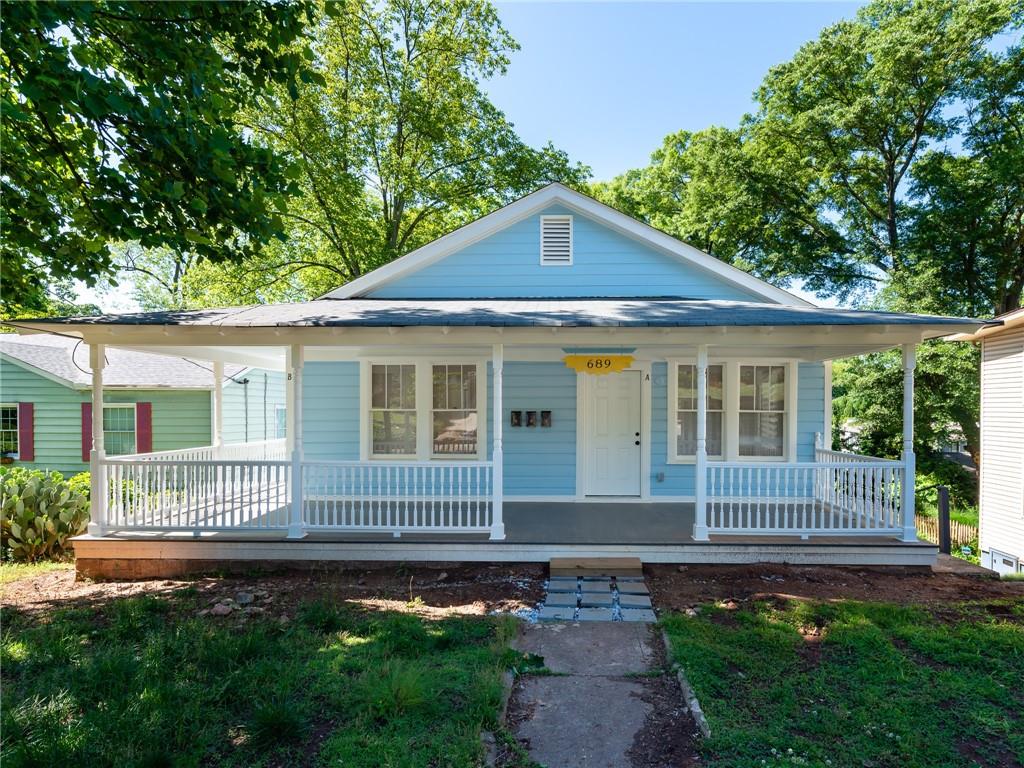 Beautifully Renovated Tri-Plex in Grant Park that has been fully permitted as such by the city. The new foundation for the lower level was installed during the remodel of 2018 with the main/upper level units being remodeled in 2020 that includes all new windows, doors and systems (HVAC, electrical, and plumbing). Property boasts 2 separate 1 Bed/1Bath Units on the main/upper level that include hardwood floors, tiled shower surround and flooring. Spacious kitchens include granite counters, shaker style cabinets with large islands in both main floor units. All appliances included with stackable washer/dryer.
The 3rd larger unit is a 1 Bed/1.5 Bath with hardwood floors, large master bath with tiled shower surround and flooring. Spacious kitchen with open concept layout includes concrete counters, shaker style cabinets with huge peninsula island and subway tile backsplash. Beautiful woodwork trim and beam accents throughout with repurposed antique barn door. All appliances included with full size washer/dryer located in separate very spacious laundry room. On and off-street parking is available. This wonderful property is perfect for a seasoned investor as it is fully tenant occupied and income producing or an owner occupant looking to capitalize on the thriving Grant Park neighborhood.