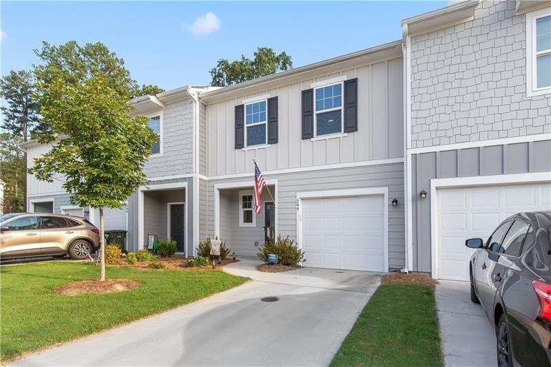Premium location and premium lot which makes this an awesome Townhouse!! Welcome to this beautifully maintained townhome offering comfort, convenience, and style. Featuring 2 spacious bedrooms, 2 full bathrooms and a convenient half bath on the main level, this home is perfect for modern living. The open concept living and dining area is ideal for entertaining, while the kitchen boasts ample cabinetry and counter space. Upstairs you will find two genoursly sized bedrooms each with its own en-suite bath, providing privacy and comfort perfect for a roommate situation. Located just minutes from downtown Cartersville, shopping, schools and I-75, this townhome blends suburban tranquility with easy access to all the essentials