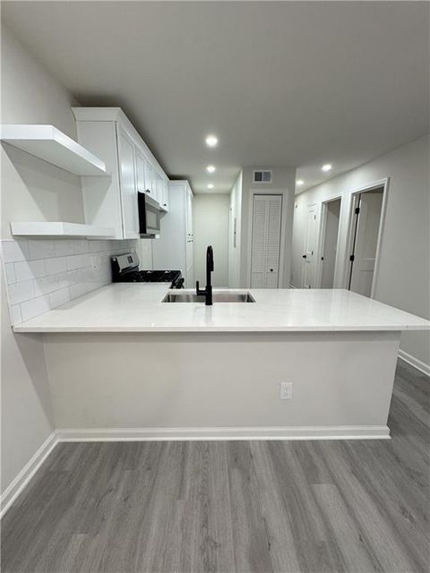 Photo of 596 Windchase Lane, Stone Mountain, GA 30083 (MLS # 7654118)