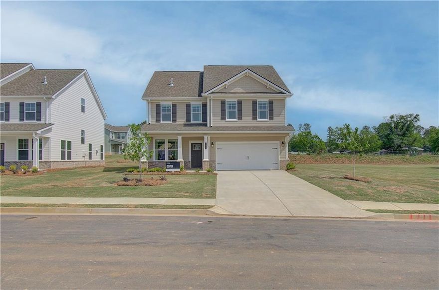 Introducing Homesite 85, the stunning Devon Plan within the luxurious Cooper Park Community of McDonough, GA. This remarkable 4 bedroom, 2.5 bath property features a spacious open concept kitchen, complete with a large island that overlooks the breakfast area and family room—perfect for entertaining and family gatherings. The stylish design includes quartz countertops, stainless steel appliances, and a chic backsplash that elevates the culinary experience. The generous primary suite serves as a luxurious retreat, boasting a walk-in closet and a private en suite bathroom featuring a dual vanity, a relaxing tub, and a walk-in shower adorned with elegant tile. Each bathroom in the home showcases solid surface countertops for both style and functionality. For added versatility, the home includes a bonus room on the third level, which can be transformed into a fifth bedroom or serve as a game room or home office, along with an additional full bath. Plus, the home features a basement, providing even more space for storage or future customization to suit your lifestyle. Located conveniently close to Interstate 75 and a wealth of shopping and dining options, this home is situated in the sought-after Dutchtown School District. The community amenities enhance your lifestyle, featuring a cabana, swimming pool, playground, dog park, and walking trails. *Stock Photo (not the actual house). Experience upscale living at its finest in this beautiful new plan! Please note: If the buyer is represented by a broker/agent, DRB REQUIRES the buyer’s broker/agent to be present during the initial meeting with DRB’s sales personnel to ensure proper representation. If buyer’s broker/agent is not present at initial meeting DRB Group Georgia reserves the right to reduce or remove broker/agent compensation.