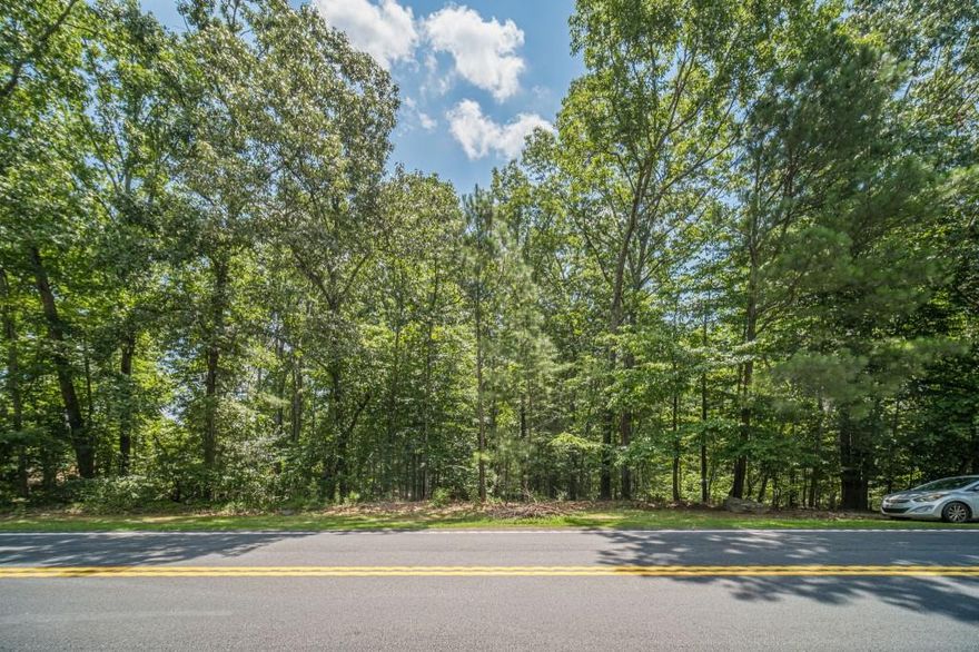 Custom Home Builders Welcomed! NO HOA! Soils suitable for Multiple Homesites(Subject to Gwinnett County Approval). One of the Last Remaining Estate Lots Available in Suwanee and North Gwinnett School District. This lot is 4.15+- acres and is a RARE find! Minutes from Bears Best, Settles Bridge Park, Highway 85/985 and 20, Mall of Georgia! Your Future Homesite is located on a Street with Numerous Multi-Million Dollar Properties! This lot has matured hardwood trees and gorgeous topography that will lead to private setting with a peaceful entry way. Homes are selling in the Area for over 3 million! Located in a thriving area known for its community appeal, top-rated schools, and easy access to parks, dining, and shopping, this lot combines the best of peaceful living with urban conveniences. Zoned R-140.