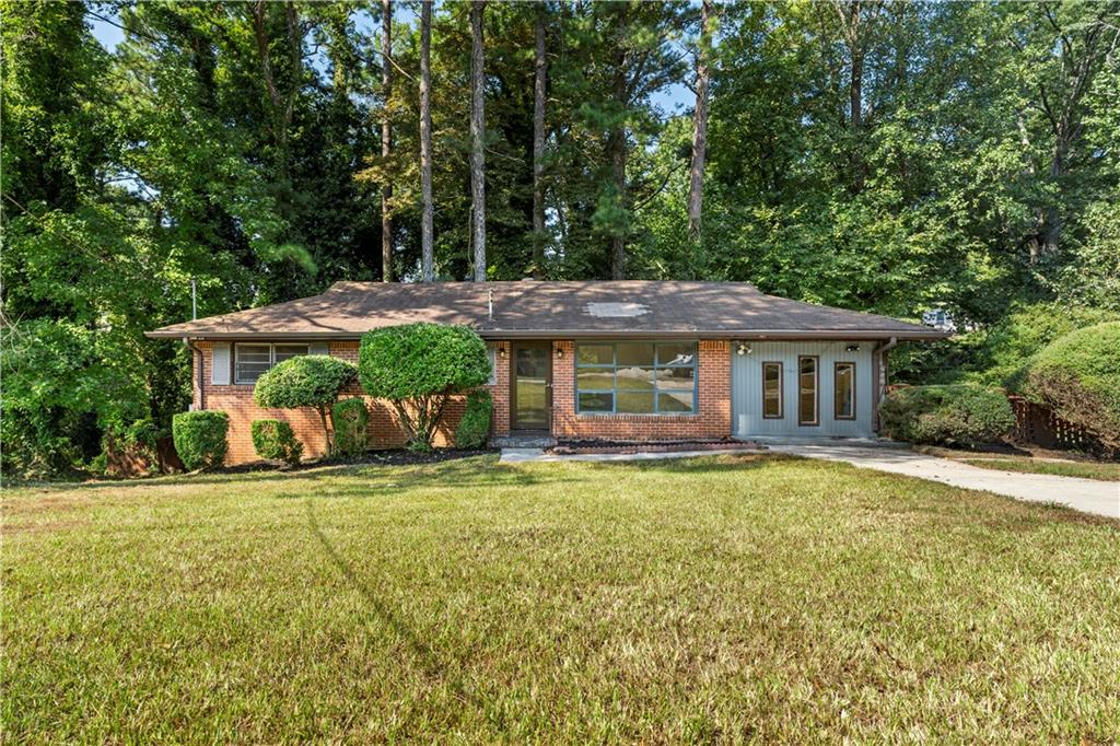 Great investment opportunity! 3 bed 1.5 bath ranch home in Southeast Atlanta. This ranch home needs some TLC. Home is near both interstates 285 and 20. Enjoy a large lot with mature trees, a level backyard, and plenty of potential for renovations or expansion. Convenient to shopping, schools, and public transportation. Perfect for investors or buyers looking to add value and create their own space.