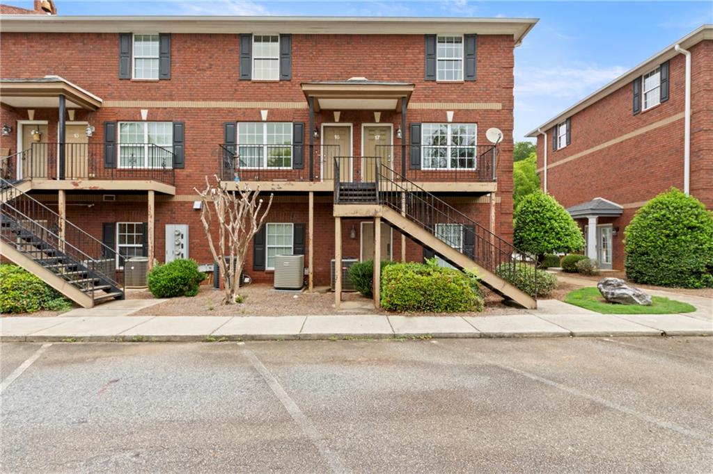 Conveniently located just minutes from the loop and less than half a mile from the new Oak Grove Shopping Center, this 2BR/2.5BA condo in Jefferson Place offers low-maintenance living in the heart of Athens. The main level features an open-concept living/kitchen area, half bath, and laundry closet with a washer/dryer included. Upstairs you'll find a spacious primary suite with double closets and private bath, plus a second bedroom and full hall bath. HOA covers trash, exterior maintenance, and lawn care, two parking spots are assigned for this unit. Just 3 miles to UGA Medical Campus, Normaltown, and Piedmont Athens Regional. Great for an investor with a solid previous rental history.