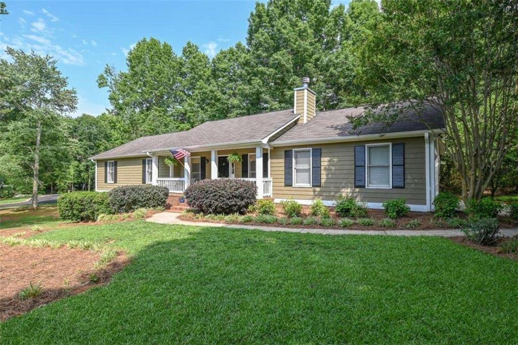 1031 Sagefield Drive is perfect for multi-generational living with a full finished daylight basement that features a kitchen on each level! Conveniently located off Mars Hill Road and tucked away in Fieldstone subdivision, this home sits perfectly on an idyllic corner lot. At just under an acre, it boasts a fully fenced-in backyard, mature shade trees, and is on a cul de sac lot. The home features 5 bedrooms and 3 full baths. 3 bedrooms (with freshly cleaned carpets) and 2 full baths are on the main level. 2 bedrooms and 1 full bath are in the basement. This home has space for everyone, whether you're in the living room by the brick fireplace flanked by built-in bookshelves or enjoying nature on the rear deck, or enjoying a family movie night in the TV room. Finished in 2023, the walk-out basement also features two bonus rooms that can be used as an office/gym/computer room. There is also an open rec/TV area. The kitchen features SS appliances and white cabinets. Off the kitchen you can access the pantry, laundry room (with loads of storage), another access door to the back deck and access to the 2 car garage. On the other end of the home are the bedrooms and interior basement access. The large master bedroom features a cozy retreat with ensuite bathroom with separate soaking tub, shower, and double vanity. The additional bedrooms are spacious and share the second bathroom. Come see all that 1031 Sagefield has to offer you to enjoy the finest living, the award-winning Oconee County School district, and plenty of space close to it all!