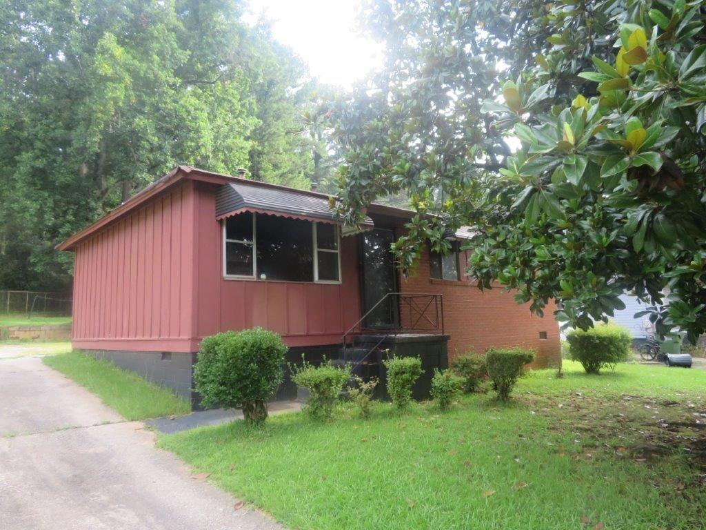 Four sided brick ranch in Carver Hills! Spacious living room with hardwood floors! Three bedrooms and a full bathroom! Additional bonus room! Plenty of backyard space! Located close to shopping, dining, entertainment, and easy access to the interstate! Close to downtown! Great opportunity! Don't miss out!