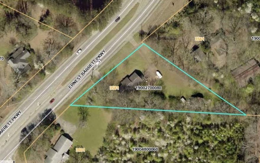 LOOKING FOR THE PERFECT LOCATION FOR YOUR DREAM BUSINESS .. RESTAURANT, DAYCARE, SMALL RETAIL? THIS COULD BE IT!! As a stand-alone property or as a part of an assemblage with the 5 acres next door, this could be a great opportunity to develop your dream. Currently zoned C-4 (Commercial Small Tract). No Sign on this property, there is a sign on the property next door.
