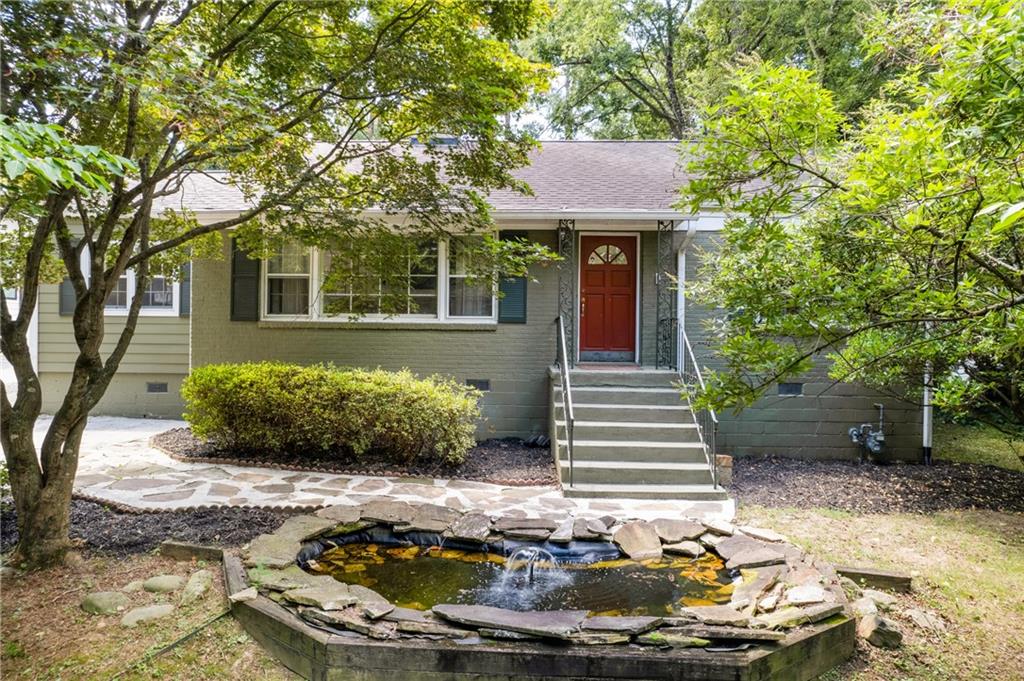 Seller offering $10,000 toward buyer's closing costs for a year-end closing! Discover the perfect blend of classic charm and contemporary elegance in this beautifully updated home in Lindridge Martin Manor, set above street level for a peaceful retreat away from the hustle and bustle. Step inside to find a fully renovated kitchen with expanded space, ample cabinet storage, and stainless steel appliances—a cook’s dream that’s both stylish and functional. Across the home, a convenient half bath has been added near the front living room, thoughtfully designed to enhance everyday comfort. Additional updates include fully renovated bathrooms, a brand-new mudroom, newly upgraded flooring, and enhanced technology with ethernet connections throughout.
One of the home’s unique highlights is its two separate living spaces, ideal for those who value privacy or enjoy their own entertainment without disruption. In the primary suite, dual closets and a beautifully renovated en-suite bathroom featuring a walk-in shower and dual vanity provide a relaxing retreat. Three additional bedrooms offer flexibility, whether for guests, a home office, or other personal needs.
Step outside to the backyard, a true haven for relaxation and recreation. This level, fenced-in oasis is perfect for entertaining, sports, or letting Fido roam free. A spacious patio is ideal for barbecues, while the screened porch offers a quiet spot to unwind and enjoy views of the lush green lawn, shaded by surrounding trees for added privacy.
Completing this exceptional property is a detached two-car garage with extra storage, adding to the convenience of this move-in-ready home. Located just minutes from Lindbergh's shopping, dining, and parks, with quick access to Lenox Square, Phipps Plaza, MARTA, GA 400, and I-85, the home is nestled in a friendly, social neighborhood. Plus, Armand Park’s playground and scenic trails along Peachtree Creek are just a short distance away, enhancing the neighborhood’s appeal.