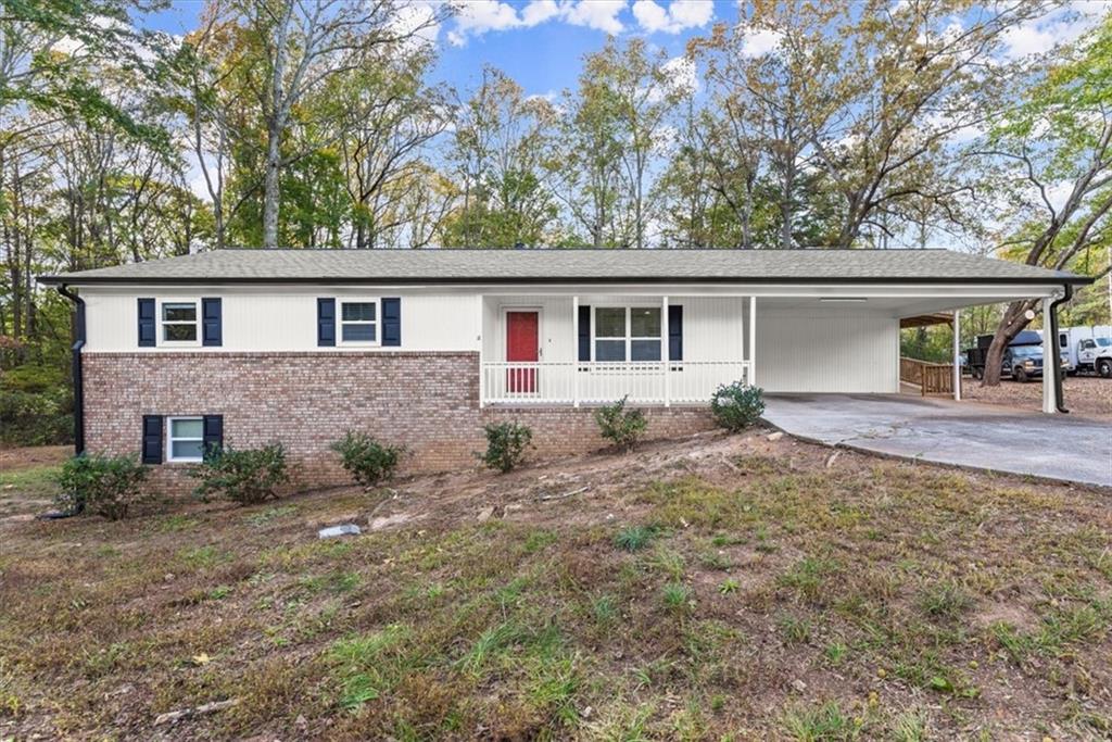 A fantastic opportunity is now available on the market for under $ 350k with NO HOA, and it's one you don't want to miss! This property includes TWO lots for the price of one, offering endless possibilities. On Lot 1, you will find a nicely renovated ranch home, cute as a button, featuring 3 bedrooms, 2 full bathrooms, an unfinished basement, and an expansive covered rear patio. The open-concept living room seamlessly connects to the kitchen and dining area. The beautiful kitchen boasts new cabinetry, quartz countertops, and stainless steel appliances. You'll also appreciate the stylish new flooring, fresh paint, and newer windows and roof. Enjoy your morning coffee while overlooking your private retreat.
**Lot 2**, adjacent to Lot 1 and over half an acre in size, is also INCLUDED! This buildable additional lot provides extra privacy and space and can be utilized however desired. Bring your plans and imagination and turn them into reality. It is conveniently located near the Silver Comet Trail, just minutes from shopping, dining, and the East-West Connector. This is a unique opportunity ideal for an owner-occupier, an investor, or both!