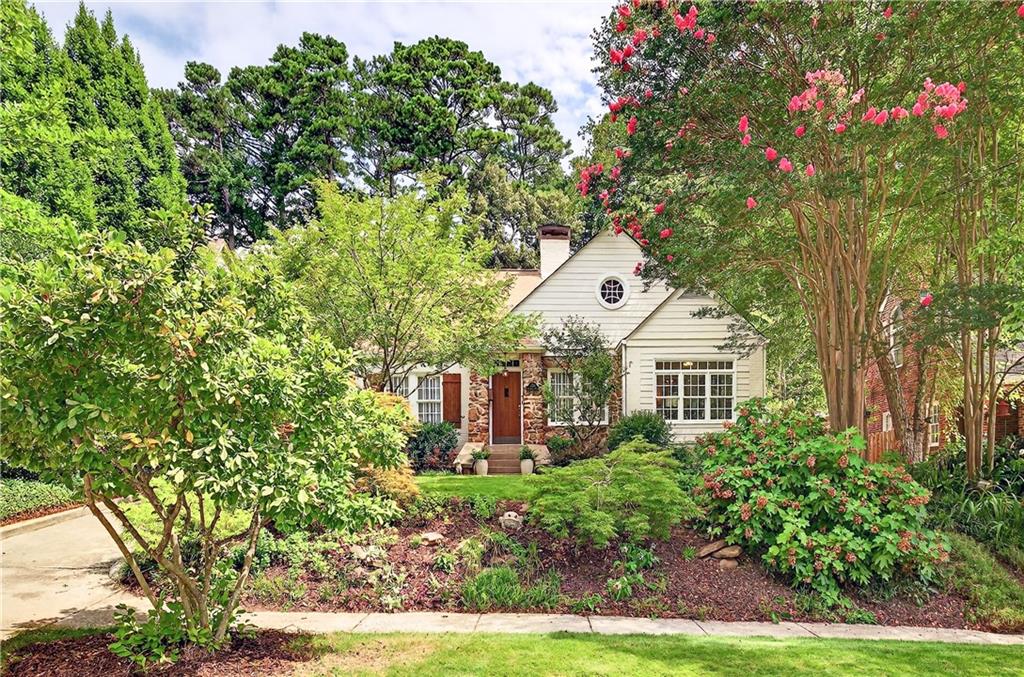 Nestled in the heart of highly coveted Morningside, this enchanting three-bedroom, two-bath brick bungalow seamlessly blends timeless character with everyday livability. From the classic brick façade to the beautifully crafted stonework at the entrance, this home welcomes you with curb appeal and charm that only gets better inside.
Step into warm, light-filled interiors featuring rich architectural details, original touches, and thoughtfully designed spaces throughout. The main level offers two spacious bedrooms and two full bathrooms, along with a sun-drenched Florida room perfect for morning coffee or quiet reading. Enjoy formal entertaining in the elegant dining room or relax in one of the two inviting living areas.
The well-appointed kitchen is both stylish and functional, featuring floor-to-ceiling cabinetry, sleek stainless steel appliances, a gas cooktop, double ovens, and ample counter space — perfect for both everyday meals and gourmet entertaining.
Upstairs, a large, finished space serves as the third bedroom and offers incredible versatility — ideal for a future primary suite, additional bedrooms, office space, or a custom layout to suit your needs.
Large lot with expansive, landscaped backyard provides a serene and private retreat — perfect for outdoor entertaining, gardening, or relaxing evenings under the stars. With ample space for a detached two-car garage and future home expansion, the possibilities are endless.
A rare opportunity to own a home with such charm, potential, and location — all within one of Atlanta’s most desirable neighborhoods, just minutes from parks, schools, dining, and more.