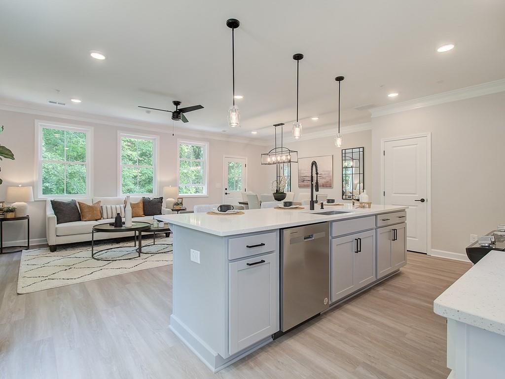 Traton Homes welcomes you to Winsome Park located in Woodstock Georgia. Our award winning Brooks J floorplan ready December/January and is optimized for entertaining, working from home and a lock and leave lifestyle. With a kitchen that WOWs, you will love the large center island with quartz tops, seating for 4 and plenty of prep space. There is also a walk-in pantry and gas cooking. Light from multiple windows floods your family room and dining areas and is a wonderful place to gather with friends and family. Upstairs is a flexible loft area perfect for a home office, play space or sitting area. The oversized Owner’s suite includes a sitting area, huge closet and nicely appointed bath with spacious shower, dual vanity and linen closet. Secondary bedrooms are very generously sized and share a full bath. The best part of this home is the location tucked away in back of the community! Hurry this home won't last and currently you will be able to visit our Design studio and select most finishes!! Home is under construction. PHOTOS WITH FURNITURE ARE STOCK PHOTOS AND ARE NOT OF ACTUAL HOME.