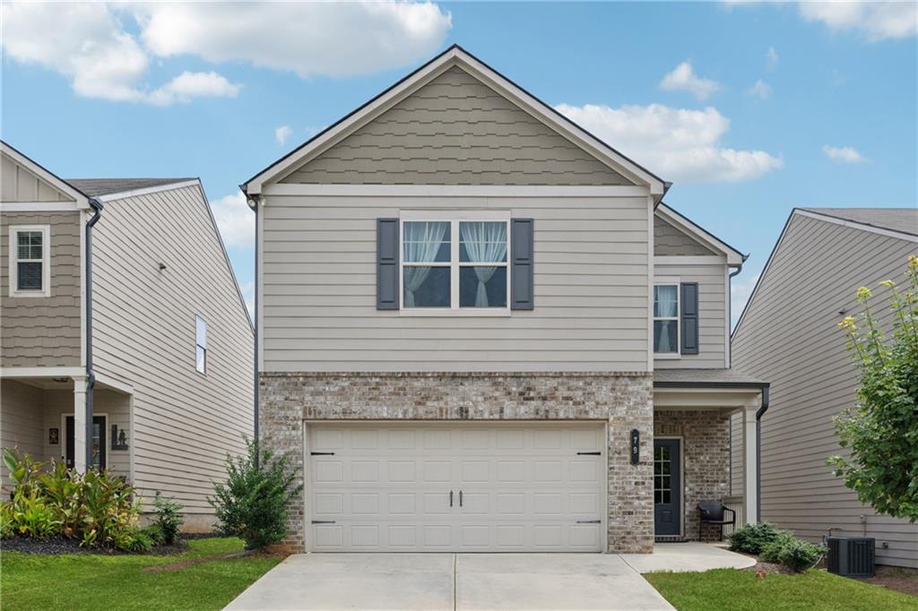 Beautifully maintained 4-year-old 3BR/2.5BA home in a desirable neighborhood with community pool and playground. The inviting floorplan flows seamlessly and feels great as you walk through, combining comfort and functionality. The main level offers a an open concept combining the dining, kitchen, and family room, while upstairs you’ll find spacious bedrooms with oversized closets—even in the secondary rooms. The large primary suite features a generous walk-in closet. Prime location with easy access to highways, including GA-316.