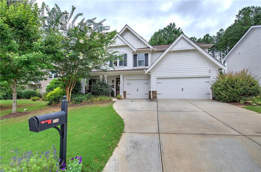 Welcome Home to 142 Floating Leaf Way! A stunning Craftsman Style Home in Highly Sought After Edenwood Community and North Paulding School District. A spacious, move-in-ready home offering the perfect blend of style, comfort, and functionality. Featuring 5 bedrooms, 2 1/2 baths, 2 bonus rooms with endless possibilities, and over 3,000 square feet of well-designed living space. The main level showcases a grand foyer, formal dining room with coffered ceilings, and a spacious fireside family room open to the chef’s kitchen. The kitchen boasts granite countertops, stainless steel appliances, tile backsplash, a large island, and oversized pantry. The main level features two bonus rooms, ideal for an office, gym, gaming room...The possibilities are endless! Upstairs, retreat to the oversized owner’s suite, spa-inspired bath with dual vanities, soaking tub, separate shower, and an expansive walk-in closet. Four additional secondary bedrooms, One full additional bath, and a laundry room with a mud sink. Each room featuring large walk in closets. The backyard is private and fenced, perfect for relaxing or entertaining on the extended patio. Enjoy the rocking-chair front porch and beautifully maintained exterior. Additional private fenced area for the dogs to go and explore that is separate from the families outdoor play area. 3 Car Garage! Don't miss out on this gorgeous home!