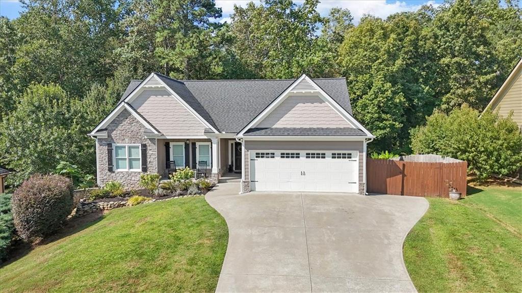 Welcome to this beautifully updated and spacious home at 421 Tom Avery Dr in Ball Ground, GA. This 4-bedroom, 3-bathroom residence offers a generous 1,677 square feet of living space, thoughtfully designed for comfort and modern living.
Step inside to a fresh and inviting atmosphere, enhanced by a full interior paint job in 2023. The heart of the home, the kitchen, has been completely revitalized with a full suite of new stainless steel appliances, including a microwave, stove, refrigerator, and dishwasher.
Enjoy year-round comfort with two separate, high-efficiency HVAC systems. The main level has its own dedicated indoor/outdoor HVAC unit, and the partially finished basement has a separate full indoor/outdoor system, ensuring perfect climate control throughout the entire home. The basement provides flexible space, ready for you to customize to your needs.
Outside, the property is equally impressive. The exterior was professionally painted in 2022, and a new roof was installed in 2019, providing excellent curb appeal and peace of mind. A standout feature is the expansive new deck, built in 2020, an ideal spot for outdoor dining, entertaining guests, or simply unwinding in the fresh air.
While a small project to transform a garage closet into an open closet was started—with only the initial cuts made to the drywall and door frame—the rest of the home is meticulously maintained and move-in ready. Don't miss your chance to own this fantastic property that blends style, comfort, and smart upgrades.