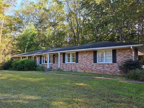 Photo of 5933 Old Stone Mountain Road, Stone Mountain, GA 30087 (MLS # 7665895)