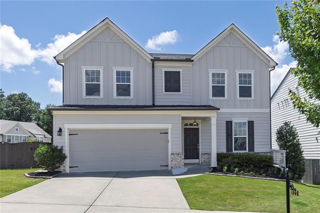 Welcome to this beautifully maintained home in a prime Woodstock location—just minutes from downtown with easy access to I-575. Positioned on a
desirable corner lot that backs up to a quiet cul-de-sac, this home offers a spacious backyard ideal for relaxing, entertaining, or playing. Built in late
2018, the home feels like new, featuring tasteful updates and abundant natural light throughout. The open-concept floor plan flows effortlessly between
living areas, and the generously sized bedrooms provide comfort and flexibility for any lifestyle. The larger community is vibrant and highly engaged. With amenities including a playground, swimming pool, tennis, and pickleball courts, there are countless opportunities for recreation and connection. Social activities such as poker nights and community golf tournaments add to the charm and liveliness of the area. Whether you’re starting or looking for a place to grow, this home offers the space, location, and community to truly thrive. Home comes complete with stainless steel refrigerator, washer, and dryer—everything you need to settle in comfortably from day one.