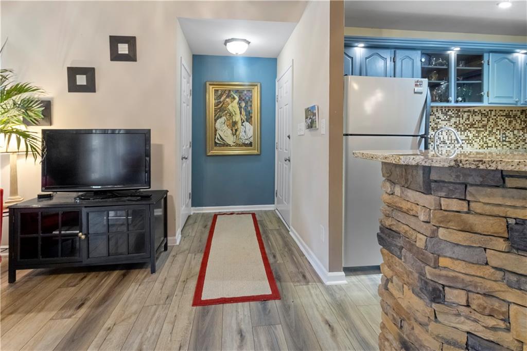 INSTANT EQUITY IN THIS TOP FLOOR UNIT!!! Step into this top floor unit with unmatched elegance and artistic flair, nestled in Old Fourth Ward. Every corner of this home tells a story, adorned with carefully curated artworks and vintage furnishings that evokes a sense of creativity and sophistication. The floor plan provides an open concept style relaxation and entertaining space with a kitchen island and vaulted ceilings, featuring one bedroom and one bathroom. Enjoy the breathtaking views of the city skyline from the private outdoor patio that also floods the home with natural light. Conveniently located to Piedmont Park, Inman Park, Ponce City Market, The Beltline and easy access to I-20/I-75/85. Ask me about the down payment assistance programs up to $45,000 on this property!