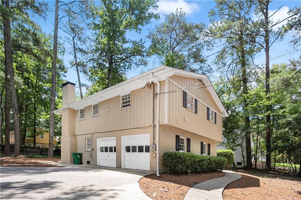 Prime Location! Just minutes from GA 400, I-285, and I-85, and directly across from Peachtree Middle School. Live in one of Atlanta’s most desirable suburbs!
This beautiful home features 4 spacious bedrooms and 2.5 bathrooms, along with a stylish kitchen upgraded with stainless steel appliances, stained cabinets, granite countertops, and tiled floors. The bright and airy layout includes a sun-filled living room, a formal dining room, and a large family room with built-in bookshelves and a cozy fireplace.
Enjoy the convenience of a 2-car garage with additional storage space, fresh interior paint, and a private fenced backyard with a patio — perfect for outdoor entertaining.
Located close to parks, playgrounds, Greenwalk, restaurants, shopping, and more — this home truly offers the best of comfort and convenience.
Don’t miss out — this gem won’t last long!
