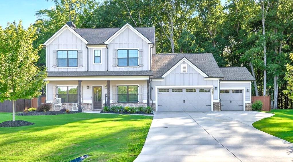Welcome home!!Built in 2022! Nestled on a beautifully landscaped 1-acre fenced lot, this stunning home combines luxury, functionality, and privacy. Step inside to find a thoughtfully designed floor plan with high-end finishes throughout. Featuring 4 bedrooms, 3 full baths. Guest bedroom/office on main. The chef’s kitchen is the true heart of the home, featuring premium appliances, ample counter space, custom cabinetry, and a large island perfect for entertaining and gathering. Enjoy spacious living areas filled with natural light, a cozy fireplace, and seamless indoor-outdoor flow to your private backyard oasis—ideal for pets, play, or peaceful evenings under the stars. Car enthusiasts and hobbyists will love the 3-car garage, offering plenty of room for vehicles, storage, or a workshop.
Located in a sought-after community in Monroe, this home offers both convenience and charm, with easy access to local dining, shopping, and schools.
Don’t miss the opportunity to make this beautiful property yours—schedule your private tour today!