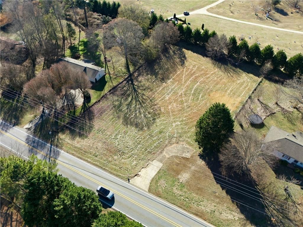 Photo of 10587 E Cherokee Drive, Canton, GA 30115 (MLS # 7704468)