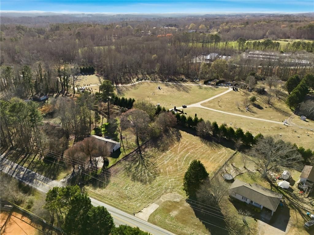 Photo of 10587 E Cherokee Drive, Canton, GA 30115 (MLS # 7704468)