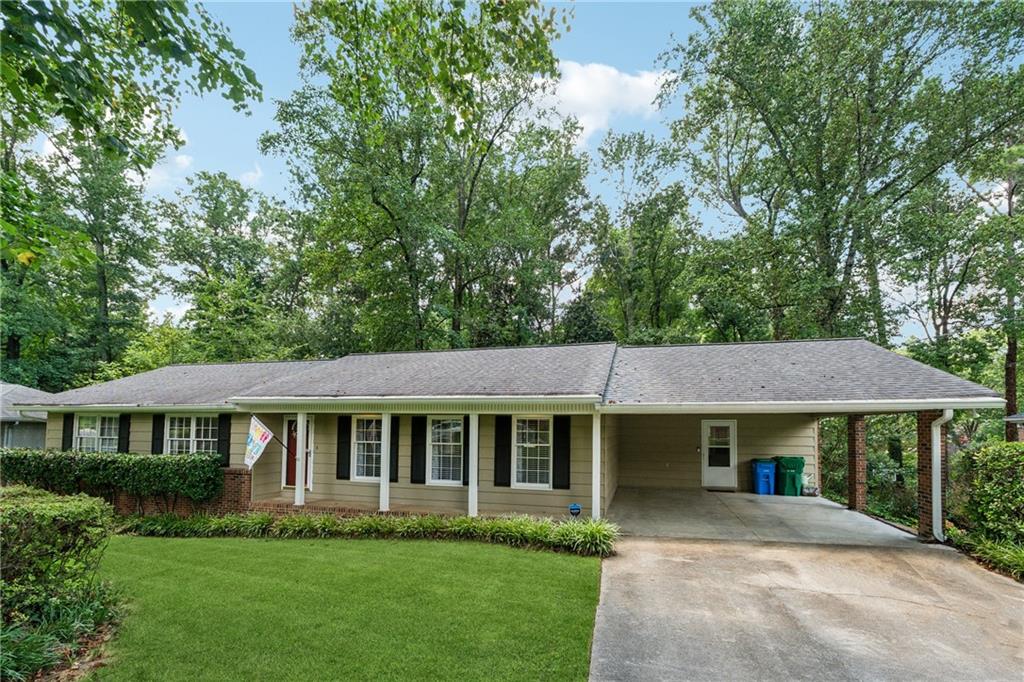 Step inside this renovated 3 Bedroom / 2 Bath Ranch and discover a thoughtfully redesigned floor plan that blends style, function, and comfort. The heart of this home is a modern, open layout! The Living Room/Family Room is spacious and bright, plus a Dining Area that's open and inviting for everyday living and entertaining. Updated with new flooring throughout, neutral paint colors, recessed lighting and a white-washed brick fireplace topped with a sleek wood mantel to create a warm welcoming living space. The kitchen features SS appliances, modern sink with disposal, solid surface countertops, under cabinet lighting, pantry, and a convenient butcher block counter for prepping your culinary masterpieces! The refrigerator remains with the home, as well as the newly installed vent hood (with built-in speaker!) over the range. There is a fun, pop of personality with the contrasting blue lower cabinets over traditional white cabinets. The bright breakfast nook is perfect for your morning coffee or casual dinners. A large Laundry Closet with extra storage rounds out this amazing kitchen! Venture outside through the back deck door that opens to a NEW large composite deck big enough for al fresco dining, grilling, and room to relax on those lounge chairs you've always wanted! This inviting backyard retreat comes complete with a firepit! In classic ranch style, the bedrooms are down the wide hallway with a separate guest bath. The primary suite features an ensuite bath with a large shower! And there's a fantastic basement with a craft room, workshop, a fully finished Movie Room/Man Cave/Play Room. There is also a huge storage room with built-in shelves for all your decorations and special treasures. In addition to the deck, other further major updates include a new AC (2024), gutter guards, and more! All the heavy lifting has been done - this beauty is ready for you! Don't miss the opportunity to make this home your own!