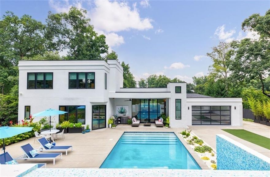 Luxury Lease Opportunity in LaVista Park: Modern Elegance with Resort-Style Living Experience elevated living in this exquisite Brookhaven residence, available for lease in the prestigious LaVista Park neighborhood—just minutes from downtown Atlanta, Emory University, the CDC, and Morningside. Designed for both sophistication and comfort, this modern home showcases an open-concept floor plan with soaring ceilings, a gourmet kitchen featuring high-end appliances, custom cabinetry, and a spacious island ideal for entertaining. The main-level primary suite offers a luxurious escape with his-and-her custom closets and a spa-like en suite bath complete with a standalone soaking tub, double vanities, and a walk-in shower. French doors open directly from the primary bedroom to your own private backyard oasis. An additional en suite bedroom on the main level provides privacy and flexibility—perfect for aging parents, guests, or a nursery. Upstairs, you’ll find two more generously sized bedrooms, including one with its own en suite bathroom, ensuring plenty of space for family or visitors. The terrace level presents endless options with room for a media lounge, home gym, office, or hobby space—plus additional storage. Step outside to your resort-style backyard, where a sparkling pool, covered lanai, and fully equipped outdoor kitchen await. Accessible from both the great room and the primary suite, this outdoor retreat is ideal for relaxing or entertaining. A convenient poolside half bath adds to the thoughtful design. Additional features include a spacious mudroom with built-in storage and access to a gated rear-entry garage. This rare lease offering combines modern luxury with unbeatable location—close to parks, fine dining, and top-tier shopping—delivering a tranquil lifestyle just minutes from the vibrant heart of Atlanta. Don’t miss your chance to lease this exceptional LaVista Park masterpiece. Schedule your private showing today
