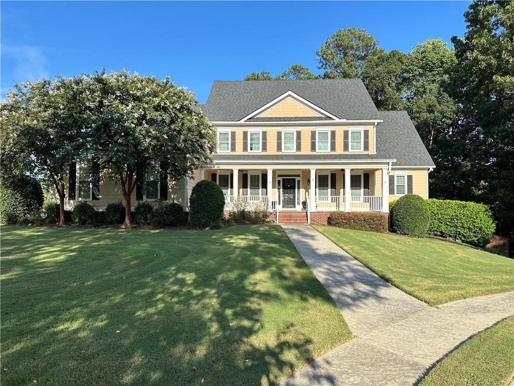 Welcome home to your lakeside retreat! This Two Homes in One gem is move-in ready and designed for both comfort and convenience. With 5 spacious bedrooms, 4 full and 2 half baths, 2 full kitchens, and 2 laundry rooms, this home offers unmatched flexibility for multi-generational living, entertaining, or hosting guests. All of this comes with a beautiful view of the lake, a private yard, and your own dock for the perfect waterfront lifestyle.
From the inviting rocking chair front porch, step inside to discover an elegant traditional floor plan. To the right, a cozy office/reading room with fireplace offers the perfect work-from-home retreat, while the left side welcomes you with a formal dining area ideal for gatherings. Both spaces showcase rich hardwood floors, including brand-new hardwood flooring in the living room that adds warmth and style.
This home has been thoughtfully updated throughout: enjoy new upstairs carpet, a fully remodeled master bathroom and walk-in closet, brand-new windows, an updated chef’s kitchen with modern finishes, and a brand-new basement A/C system for year-round comfort. Every detail has been carefully maintained and upgraded to ensure a home that feels fresh, modern, and ready for its next chapter.
Whether you’re enjoying quiet mornings on the porch, entertaining lakeside, or relaxing in your beautifully updated owner’s suite, this home offers the perfect balance of luxury and livability. Truly move-in ready — all that’s missing is you.