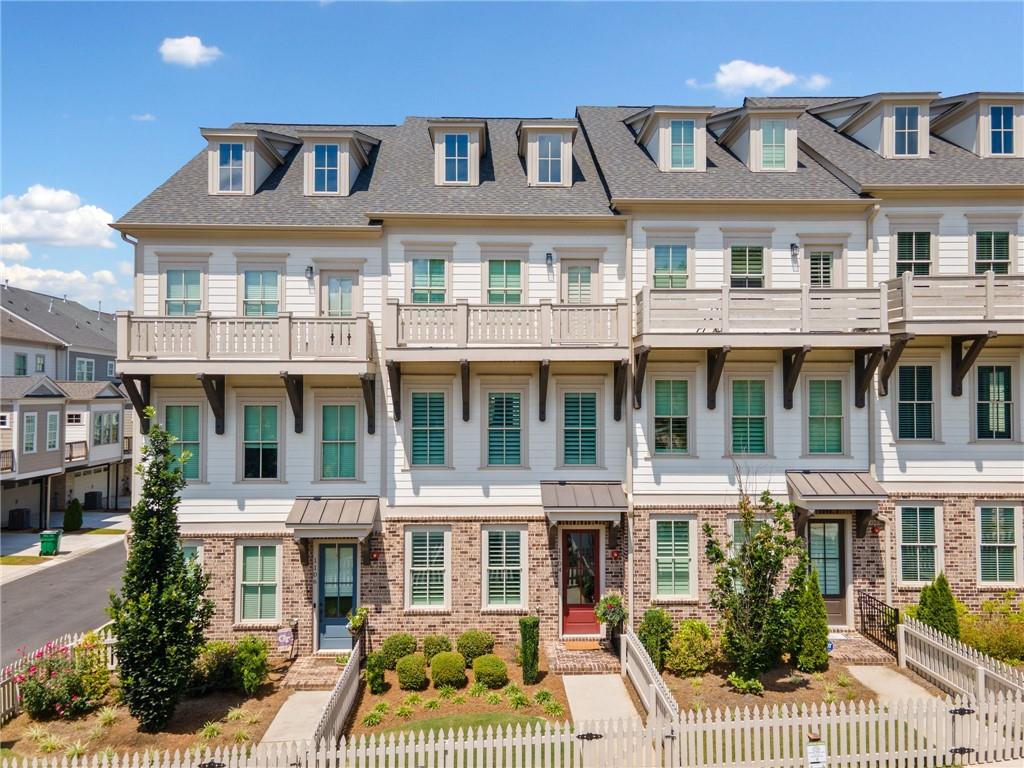 Discover luxurious living in the heart of South on Main, just moments from the lively shops, restaurants, and entertainment of Downtown Woodstock. This stunning 3-bedroom, 3.5-bath townhome surpasses new construction with its high-end finishes and thoughtful upgrades throughout.
Enjoy wide-plank luxury vinyl flooring, an oversized two-car garage with built-in storage, and a brand-new elevator that serves all levels—even the attic for convenient extra storage. Attic can be finished out for additional living space.
The open-concept layout offers a versatile entry-level guest suite complete with a full bath, perfect for guests or a home office. The chef’s kitchen impresses with custom cabinetry, premium appliances—including a built-in refrigerator and espresso machine—and sophisticated design details.
Retreat to the spacious primary suite featuring custom walk-in closets and a spa-like bathroom with elegant cabinetry.
Outdoor living is exceptional with a covered front deck on the second level and an additional open-air deck at the back, ideal for morning coffee or evening entertaining.
Embrace the perfect blend of comfort, elegance, and walkability in one of Woodstock’s most desirable communities. South on Main provides a wealth of amenities, including a pool, clubhouse, parks, rentable garden plots, an amphitheater, dog park, scenic walking trails, and a fire pit area.