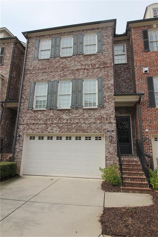 Awesome Location in the heart of downtown Alpharetta. VERY SHORT WALK to coffee, restaurants, bars, shopping, plus just a short trip to Avalon. Light and bright open floorplan. Gourmet Kitchen with huge island, SS Appliances inc. frig. Hardwoods on all levels - No Carpet! Tile baths, private deck, washer and dryer included. Patio on lower level.