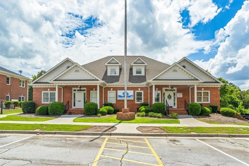 Welcome to the opportunity of an investment lifetime at 889 Commerce Drive Southwest, Conyers, GA. Situated in a thriving commercial district, this property poses an exceptional multi-tenant revenue stream for prospect investors. The building has been updated recently and exhibits a modern aesthetic appeal. The update included a stylish revamp of the functional elements, committing to over-all usability of the complex. Step inside to observe the rendition of LVP (Luxury Vinyl Plank) flooring installed throughout, complementing the neutrally toned walls aside. The flooring ensures durability and easy maintenance, perfectly aligned with the high-traffic nature of a commercial establishment. The property exhibits structural practicality in terms of layouts and designs. It incorporates six suites, each presenting its unique layout and offers versatility in terms of business adaptability. Notably, Suite A is currently occupied, engaged in a seamless annual lease, ensuring a steady revenue from day one. A distinguished feature of the property is the incorporation of four fully updated kitchenettes. These areas stand out with their functionality and ease of use, equipped to handle busy routines, whether it be an office setting or other commercial purposes. These convenient shared spaces ensure a welcoming environment for tenants and their guests, making it an attractive proposition for potential occupants. Adding to the convenience are seven total bathrooms, meticulously kept and updated to cater to the influx of daily use in a commercial establishment. The property's location in Conyers, GA is an added advantage, sett within a vibrant, well-connected commercial precinct. The area boasts an array of businesses, easily accessible amenities, and excellent transportation links, which further enhances the attractiveness of this investment opportunity. In conclusion, 889 Commerce Drive Southwest tempts with its generous upgrades, vibrant location, and strong tenant potential. This landmark property encapsulates the essence of a worthwhile commercial investment, promising tangible returns for its new, forward-thinking owners.