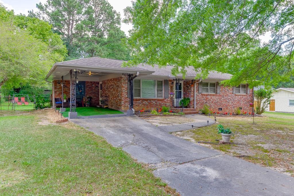 Seller Investor Sale SOLD "As-Is" - Property will remain on market for at least two weekends & Seller reserves the right to accept offer at anytime. No Blind Offers. Seller estimates FHA Financable. Opportunity awaits! Perfect for renovation enthusiasts and investors. Vintage character shines through with the classic brick exterior and solid structural bones just waiting for your modern updates. Three bedrooms, 1 and a half baths, eat-in kitchen, level and fenced backyard. See Private Listing Notes.