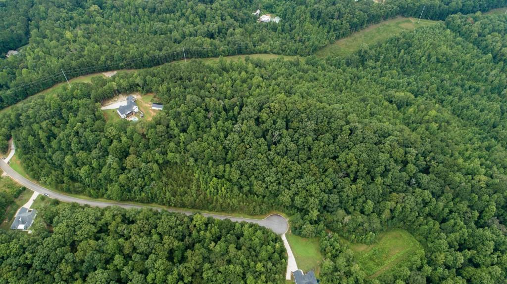 Breautiful lot in Overlook at Noth Hall subdivision. NO HOA! This property blends into nature offering tranquility and beauty. The residents of this subdivision benefit from highly regarded schools