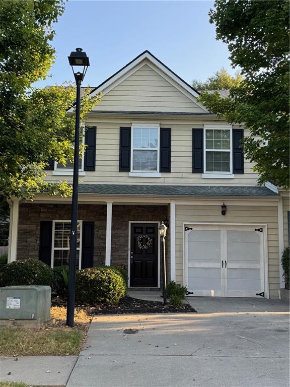 Welcome home! This charming end-unit townhome is absolutely move-in-ready. Located in desirable Holly Springs in the Hidden Springs community, this 3 bedroom, 2 1/2 bath two-story townhome has been maintained to be like new. You'll love the nearly new HVAC, water heater and roof. In addition, the whole home was freshly carpeted in anticipation of its new owners. As you arrive, you'll notice that there is plenty of parking in front, as well as a one-car garage.
The front porch is perfect for your rocking chairs and morning coffee. Entering in, you'll love the coziness of the family room; complete with a fireplace. The roomy kitchen has an eat-in area; in addition, there is a separate dining room. Stepping out back, you'll find an inviting patio and large back yard - perfect for pets or entertaining. Upstairs you'll find three bedrooms and two full baths. So much space and extra closet space. The primary suite has his and her closets and an ensuite with double vanity and separate tub and shower. You won't be disappointed with this home! Schedule your appointment to see it today.
