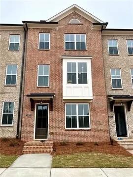 Beautiful, move in ready, 3 bedroom, 3 bathroom townhouse in the heart oof Suwanee in a gated community!! This home is located within walking distance to Suwanee Town Center, shopping, restaurants, schools and a short drive to Hwy 85. The open concept main level has an upgraded kitchen with stainless steel appliances overlooking the dining room and Living room with fireplace! Upstairs you will find an oversized master bedroom with a large walk in closet off the gorgeous and fully upgraded bathroom. An additional bedroom with full bathroom rounds out the upstairs. The terrace level has a full bathroom with an additional bedroom and a 2 car garage. This beautiful home is located in the sought after North Gwinnett High School district. Rental price includes trash and lawn care.