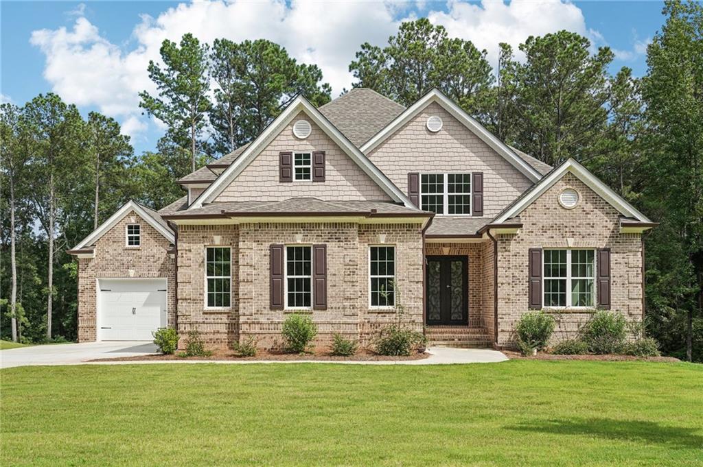 Special Financing Available Lock in a fixed 4.99 percent interest rate with preferred lenders or receive up to $15,000 in builder incentives, with additional savings available through our preferred lender network. The Layla Floor Plan offers 4 bedrooms, 4.5 baths, a massive open loft, and a large bonus room that can easily convert to a fifth bedroom. This home also includes a 2,432 square foot unfinished basement, stubbed for plumbing and ready for your vision, whether that is a home theater, gym, or guest suite. This home is ready for you to make the final design selections. Work closely with our team to personalize the finishes to your style and bring your dream home to life. Perfectly situated next to protected green space for added privacy and featuring two separate front entrances. The dramatic two story family room includes a gas fireplace framed by custom built-in bookcases. The gourmet kitchen is designed to accommodate a nine foot island or larger, making it ideal for both everyday living and entertaining. The main level primary suite features tray ceilings, hardwood floors, a spa-inspired bath, and a walk-in closet. A second bedroom with full bath is also on the main level. Upstairs includes two bedrooms, two full baths, the open loft, and the bonus room. Enjoy a covered back deck with stairs overlooking a spacious and leveled backyard. Located in a swim and tennis community with clubhouse and playground just 20 minutes from Interstate 20 with convenient access to Atlanta, shopping, and the airport. Proudly built by Hadi Builders, your trusted local custom homebuilder in Douglasville. Choose your lot, customize your finishes, or bring your own plans. We are here to help you create a home that fits your vision and lifestyle.