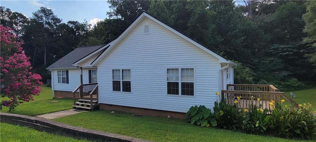 Freshly painted and clean! Ready to rent 2 bedroom/ 2 full bath ranch plan Duplex. Cute! Each bedroom has private bathroom. Large deck, and off street parking. Hardwood style floors, laundry room in unit. Stove, Dishwasher and Refrigerator included in rental. NO pets or smoking are permitted.