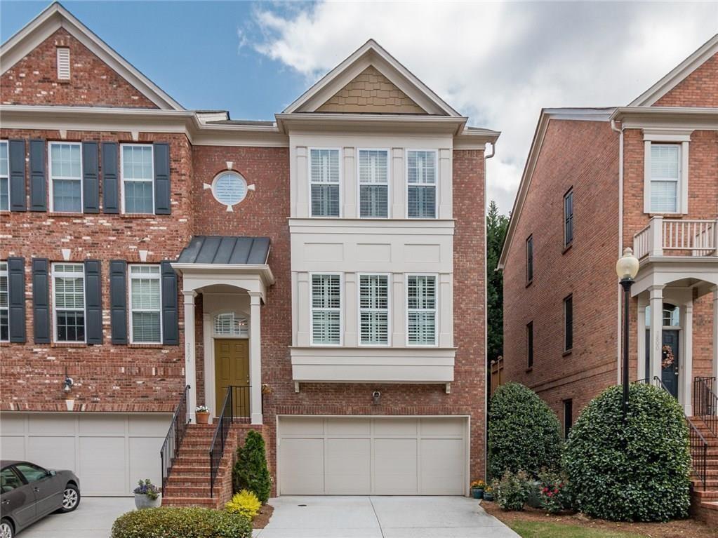 Located close to Vinings Village, this townhome combines comfort and convenience with easy access to local restaurants, shops, and community amenities.
Main Level
The main level features an open staircase leading to a spacious living room with a fireplace. The kitchen includes a large island, granite countertops, stainless steel appliances, and a breakfast area that opens to a private deck with wooded views. A powder room adds convenience for guests.
Upper Level
The upper level has a large master bedroom with an en-suite bathroom, including a soaking tub, walk-in shower, and dual vanities. A secondary bedroom with its own well-appointed bathroom provides additional comfort.
Lower Level
The lower level offers a bedroom with a private en-suite bathroom and access to a secluded patio, ideal for guests or a home office.
Additional Features
The home includes a two-car garage with a storage nook for extra space.
Location
Steps from Vinings Village, this townhome offers quick access to dining, shopping, and local attractions, blending suburban calm with urban convenience. Schedule a visit to see this well-designed home today.