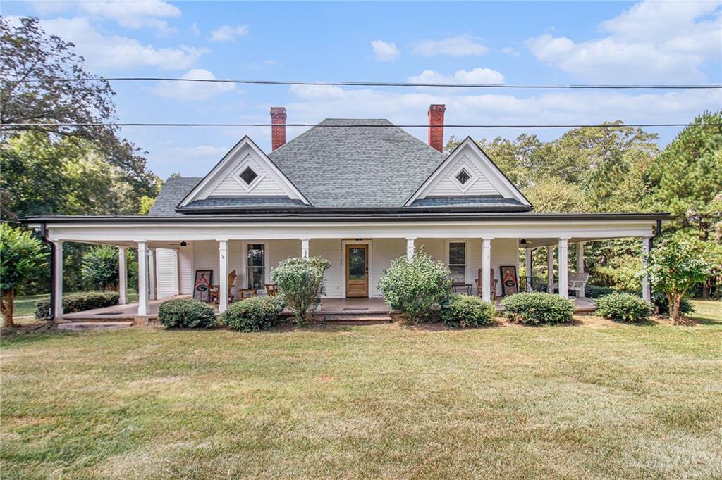 Step back in time with this remarkable historical home built in 1901, showcasing timeless character paired with thoughtful modern updates. Situated on 3.67 picturesque acres in Carrollton, this property offers a rare blend of history and convenience. Many original features remain intact, including fireplaces in both bedrooms, while the bathrooms have been beautifully renovated and the kitchen updated for today’s lifestyle. Major systems have already been taken care of — the foundation, electrical, plumbing, roof and HVAC have all been completely redone, offering peace of mind for years to come. The attic has been framed, heated, and cooled, providing incredible potential for additional future living space. With wide porches, expansive grounds, and a seamless mix of old-world charm and modern comfort, this home is a true treasure waiting for its next chapter.